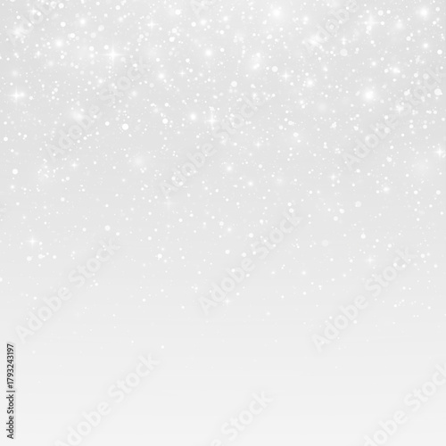 Abstract holiday background with glistering glitter and sparkling particles.