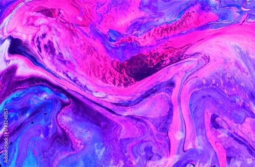 Abstract pink and lilac background. The acrylic paint flows and creates a unique pattern. Bright shades. Background of the rear view.
