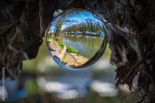 River Medway between Maidstone and Allington Lock in Kent, England shot through a lens / crystal ball
