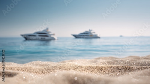 Fototapeta Naklejka Na Ścianę i Meble -  luxury yachts on calm sea viewed from sandy beach