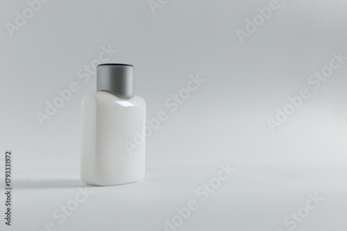 white bottle of perfume