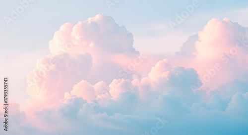 Beautiful pastel cotton candy clouds in a serene blue sky at sunrise, a dreamy and ethereal skyscape for a peaceful background