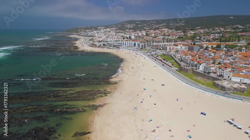 Aerial footage of the beach of Figueira da Foz and the city, It is a coastal city with several beaches, summer and seaport facilities on the Atlantic Ocean coast.