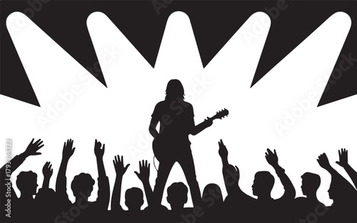 Silhouette of a guitarist performing on stage with a cheering crowd