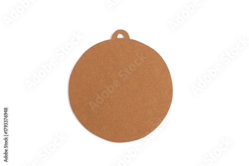 Blank Christmas bauble shape cut from brown cardboard isolated on white background