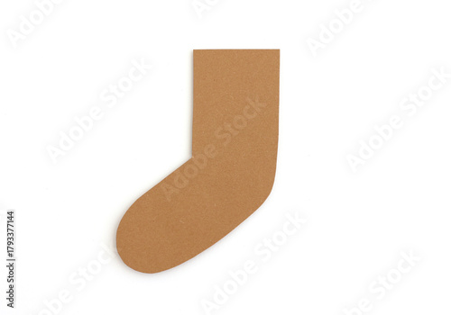 Blank brown Christmas stocking shape cut from cardboard - isolated