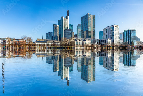 view to modern skyline of Frankfurt wit skyscraper and. with river Main in foreground