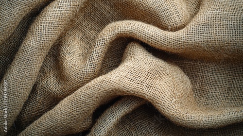 Natural jute texture burlap fabric background with woven fiber structure showing organic beige tones and rustic material surface for eco-friendly design