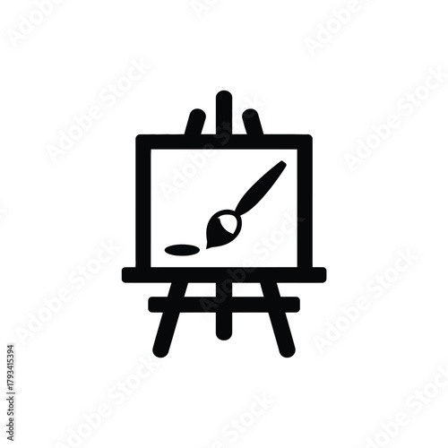 An artist's easel holds a blank canvas and a paintbrush with wet paint.