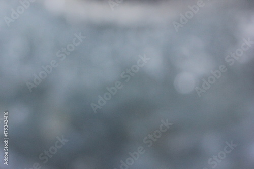 snow on the windo
An abstract view of water streaming from a fountain into a pool.