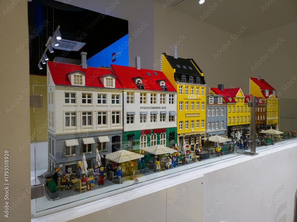 Naklejka premium Copenhagen, Denmark - November 3, 2025: Model of the New Harbour Nyhavn at the showroom of the Lego store