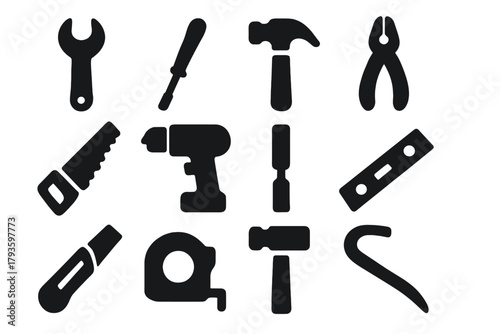Solid Tool Icons. Solid style icons of Tools: wrench, screwdriver, hammer, pliers, saw, drill, chisel, level tool, utility knife,
