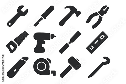 Solid Tool Icons. Solid style icons of Tools: wrench, screwdriver, hammer, pliers, saw, drill, chisel, level tool, utility knife,