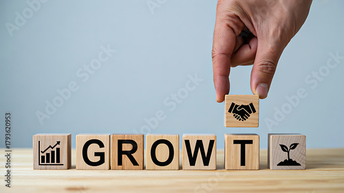 Wooden blocks spelling GROWTH with chart, handshake and sprouting plant icons symbolizing business progress, teamwork and sustainability