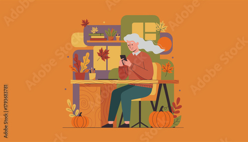 Senior woman texting on phone at cozy autumn desk with pumpkins and fall decor