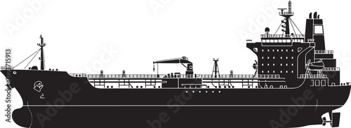 Silhouette of a large cargo ship with crane