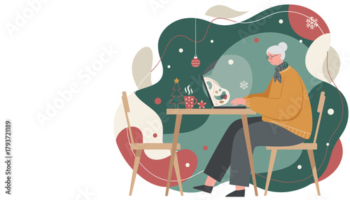 Senior woman teleworking on laptop enjoying cozy winter holiday scene
