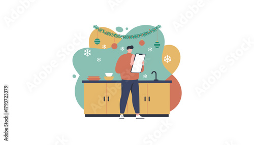 Man using a tablet for holiday preparations in a modern festive kitchen setting