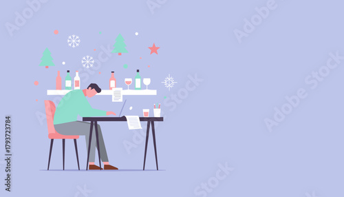 Working during the holidays man busy on a laptop with festive drinks and decorations nearby