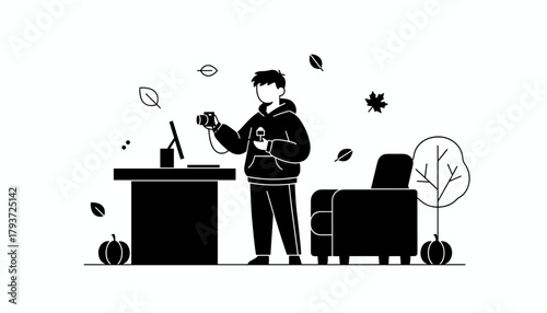 Photographer stands with camera next to a desk in an autumnal home office Black and white graphic