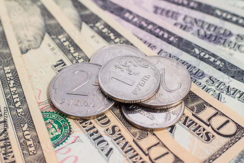 Ruble coins and dollar bills