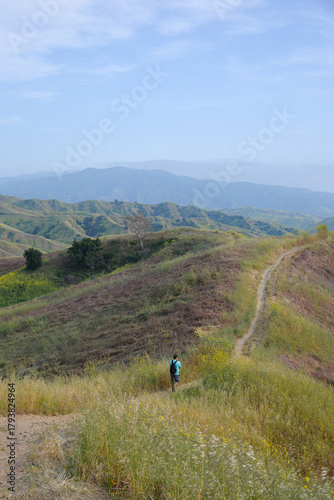 Chino Hills, California, USA - April 26, 2024: A tourist is hiking in Chino Hills State Park