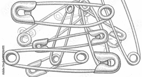 Monochromatic stippled illustration of a jumbled collection of safety pins, detail design
