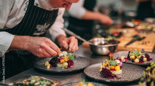 An elegant fine dining plate with shrimp, beets, cucumbers, and edible flowers presented in a vibrant and artistic arrangement.