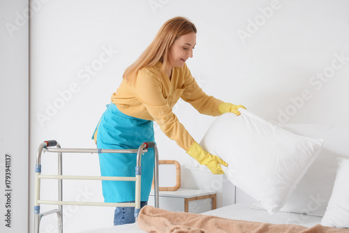 Mature woman with walker ma...