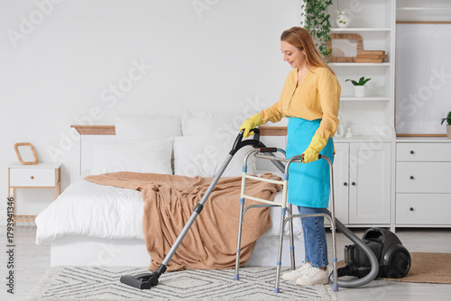Mature woman with walker va...