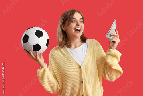 Happy young woman with socc...