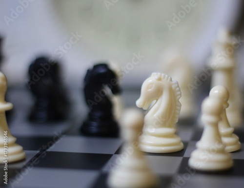 chess pieces on the chess board artistic background game playing competition	
