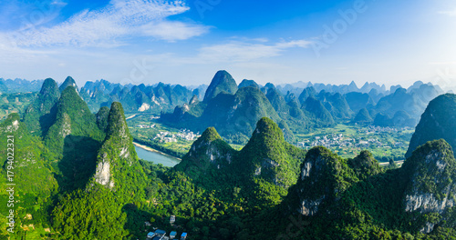 Obraz na plátně Aerial shot of the spectacular karst mountain with green valley landscape in Gui