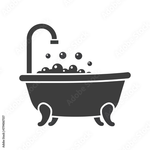 A simple, dark gray silhouette of a bathtub with bubbles and a faucet, isolated on a