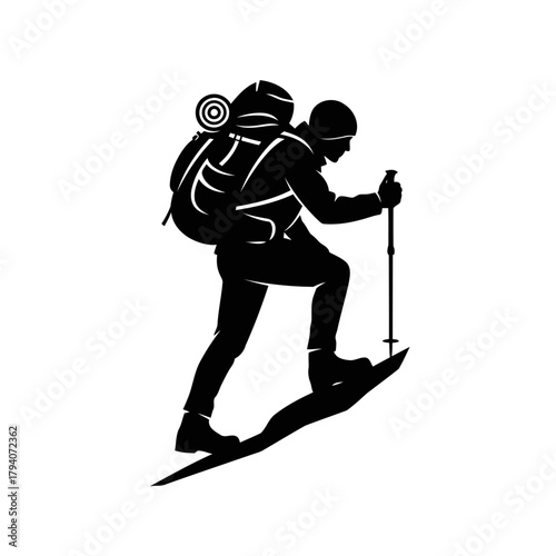 Silhouette of a hiker with a large backpack and trekking poles climbing a snowy slope