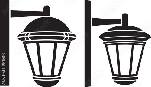 Two vintage street lamp posts silhouette