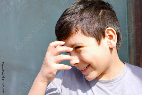 Latin child 10 years old looking glad.