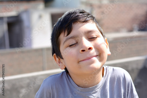 Latin child 10 years old looking glad.