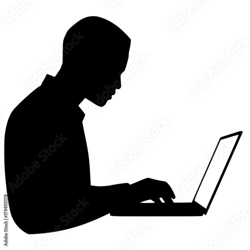 Side profile silhouette of a person working intensely on a laptop computer.