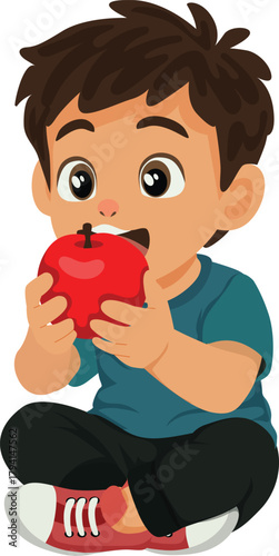 boy sit on the floor eating apple