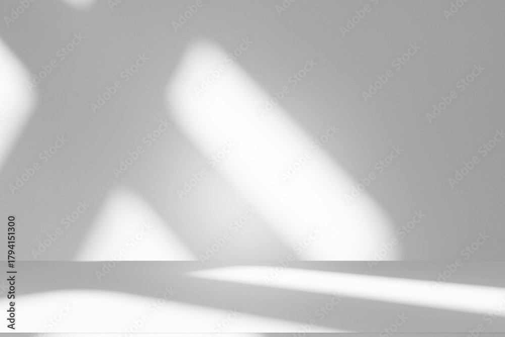 Fototapeta premium Wall interior background, studio and backdrops show products.with shadow from window color white and grey. background for text insertion and presentation product 