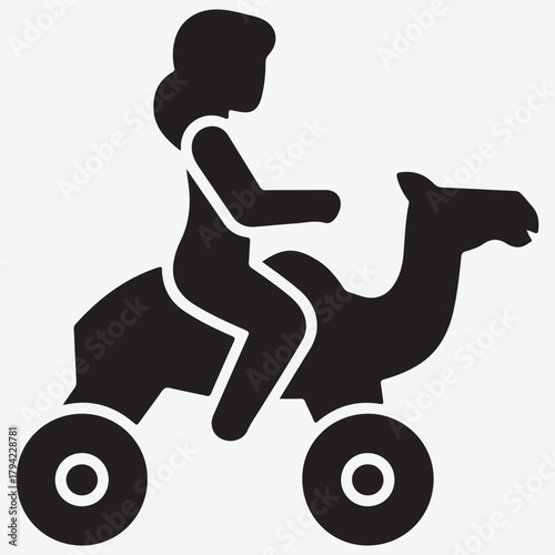 Silhouette of a person riding a camel with wheels