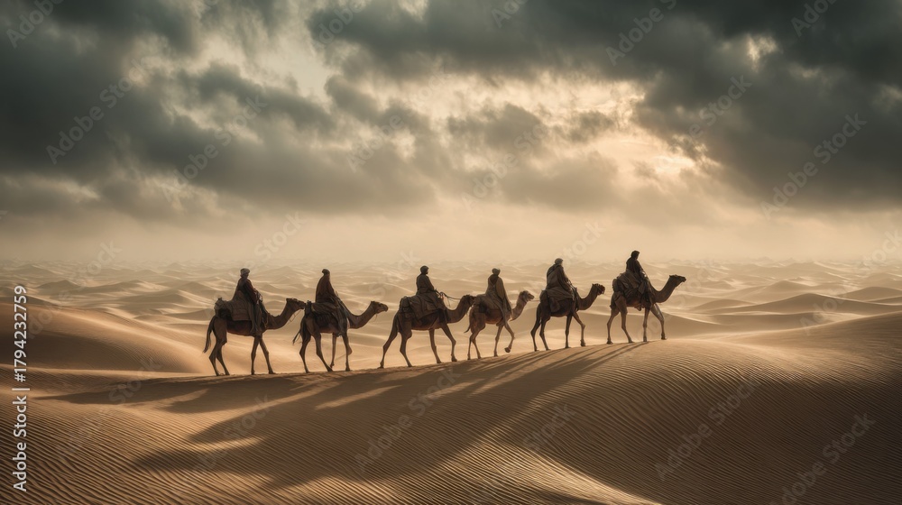 Fototapeta premium Camels Walking Across Sand Dunes Under Dramatic Cloudy Sky at Sunset in Desert Landscape