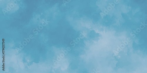 Fluffy white clouds drift across a clear blue sky, capturing the serene beauty of a summer day's cloudscape