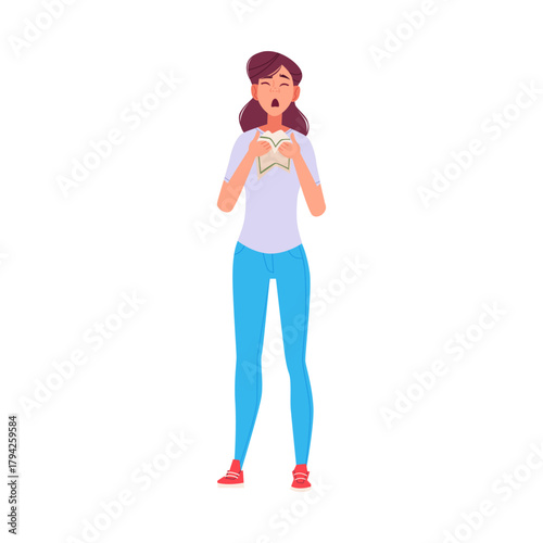 Young Woman Yawning while Reading a Book, Feeling Tired