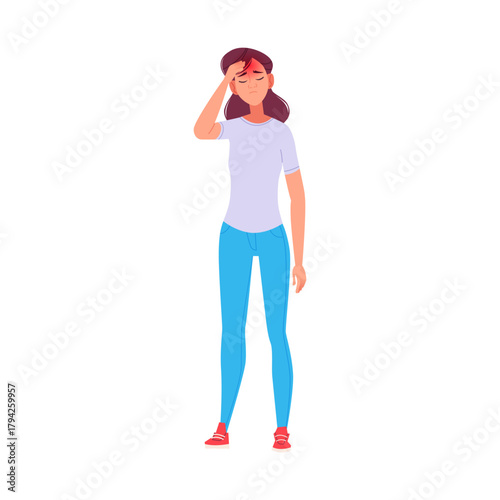 Young woman suffering from a painful headache, feeling unwell