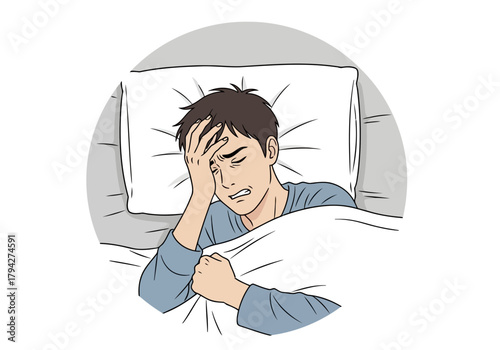 A man lying in bed, holding his head in distress and discomfort, unable to sleep