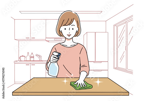 A woman cleaning a kitchen counter with a spray bottle and cloth, creating a sparkling effect