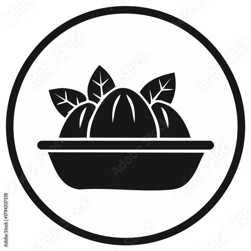 Black and white icon of lemons and leaves in a bowl, symbolizing freshness and citrus