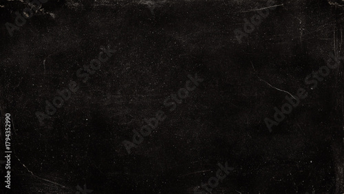 Aged grungy black surface with subtle scratches, dust, and white grain texture. Vector, illustration.